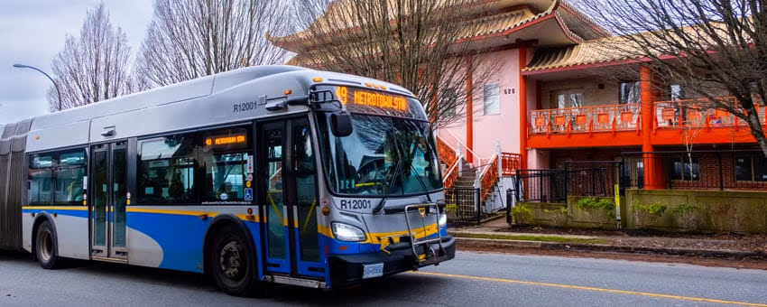 Eastbound bus along 49th avenue in front of temple