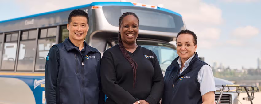 Shuttle operators in front of a shuttle