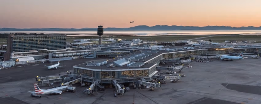 Distant aerial shot of YVR at sunrise